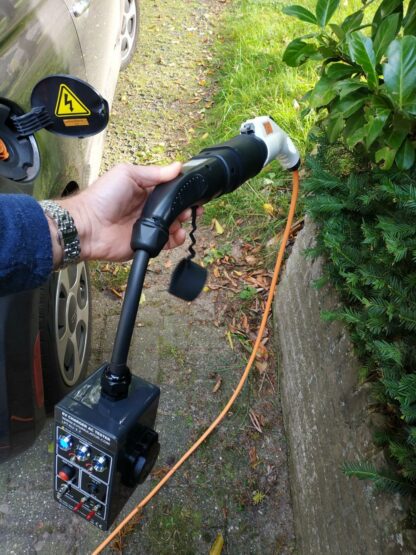 Shows Type 1 plug connected to the adapter which is connected to the (Type 2) EV Simulator