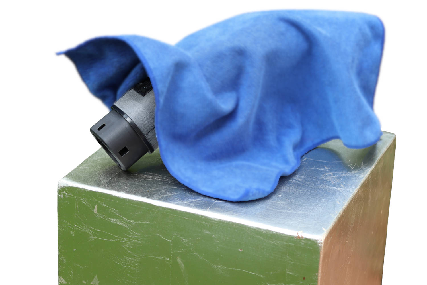 The EVSE Analyser covered by a cloth with only a small part visible. Teaser of the product