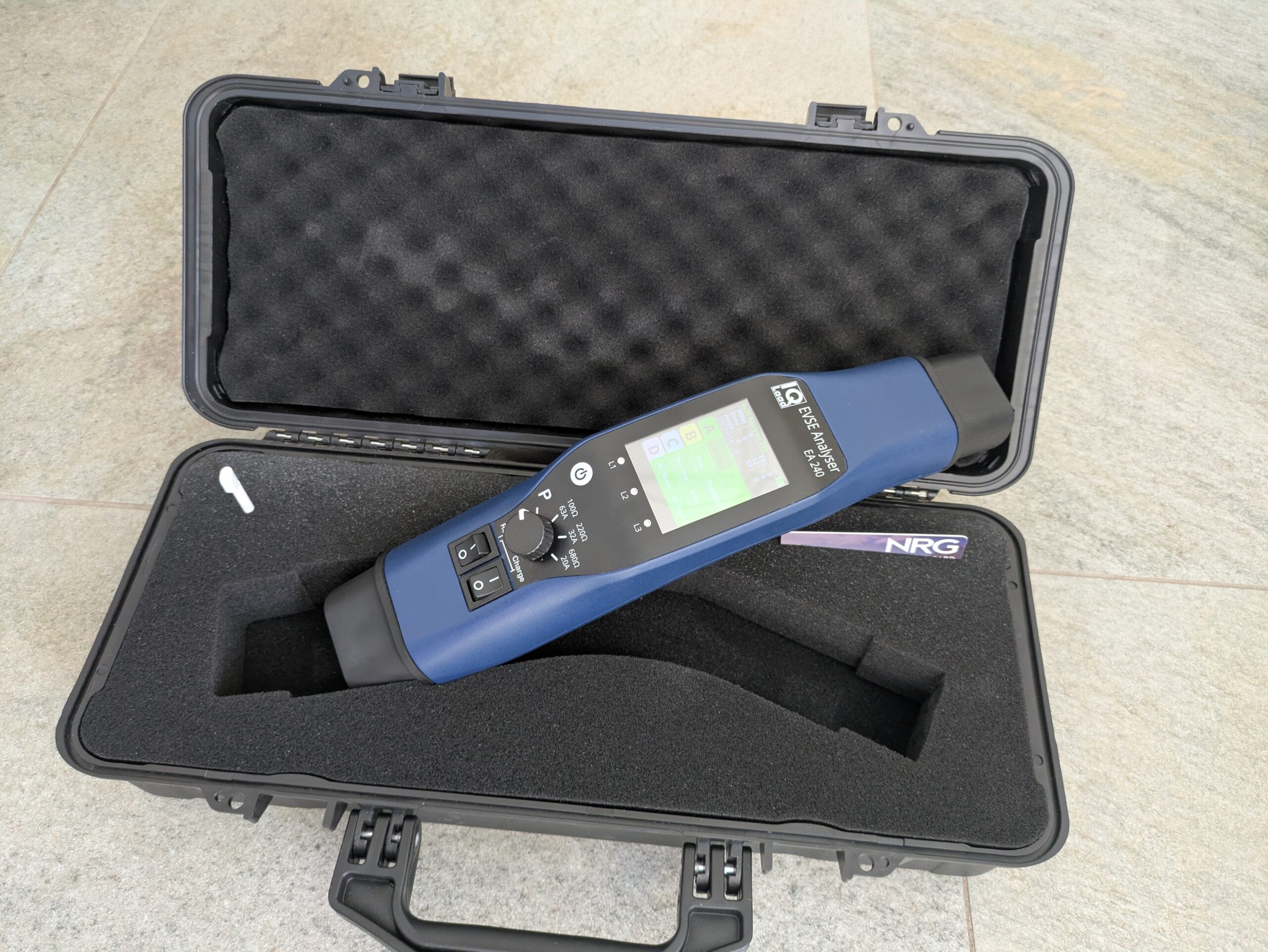 EVSE Analyser on top of it's protective box